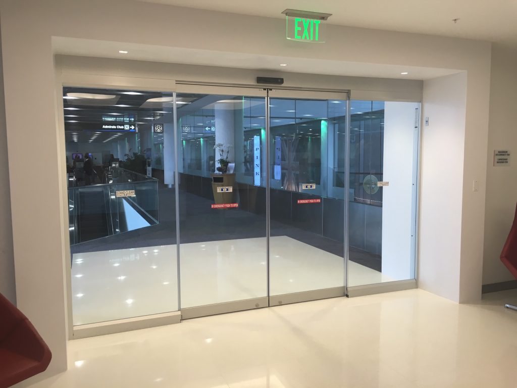 Record 5200 Series All Glass Sliding Door System Dash American Airlines Club At Mia Gate D15