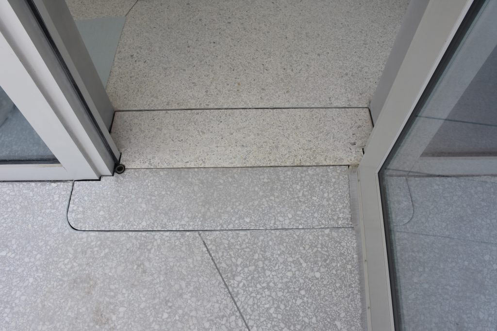 Concealed In-Ground Auto Operator - Removable Terrazzo Cover (Before Finishing)